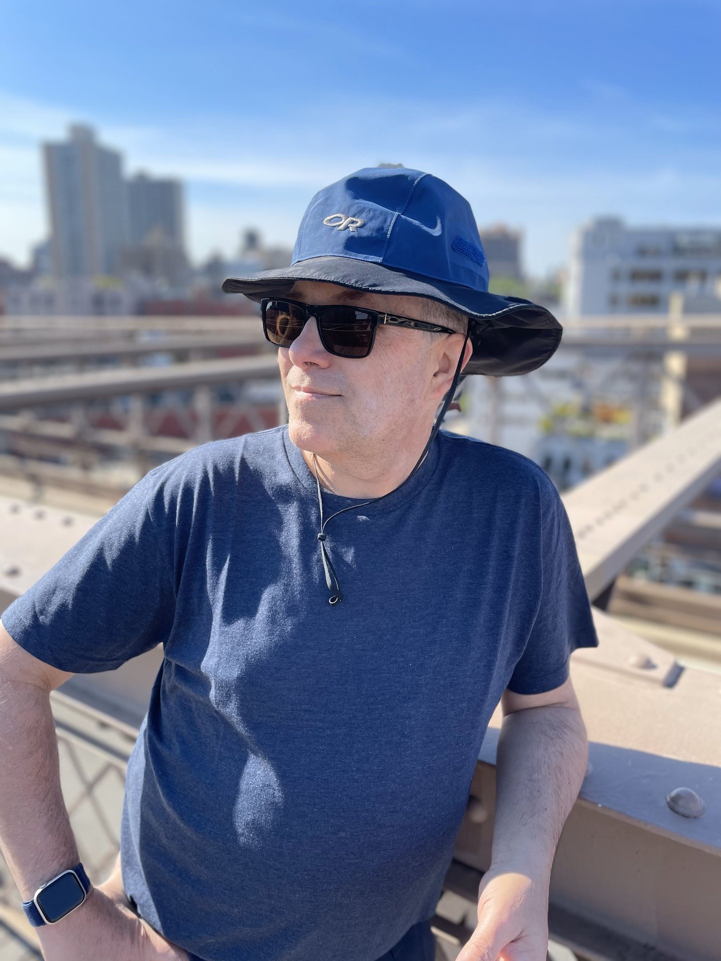 Jim (WT8P) is standing somewhere in Brooklyn, pensively looking to his right (your left).  This is one of the rare photos of myself that I find tolerable.