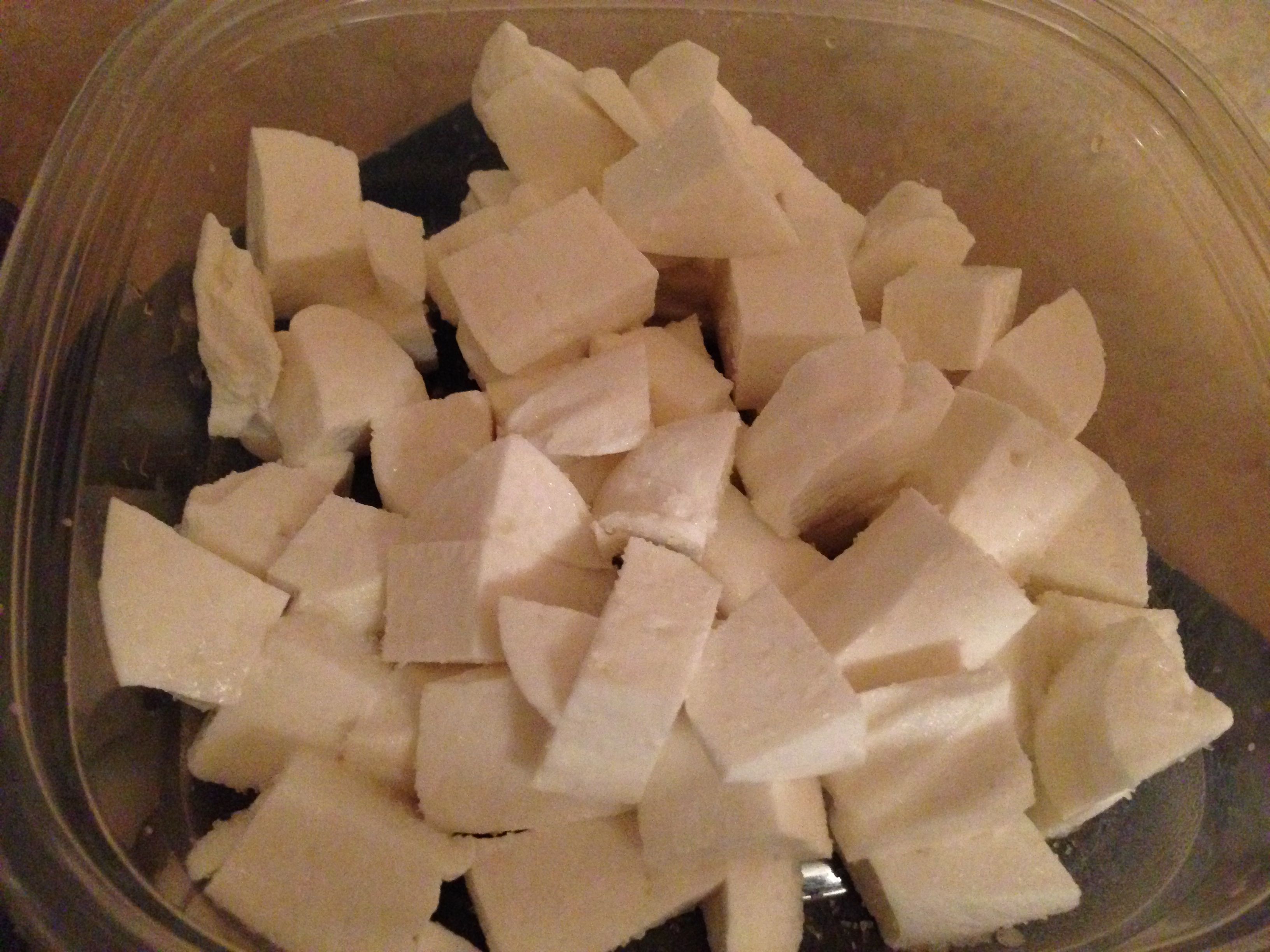 Salted feta cubes, ready to ripen for a week.